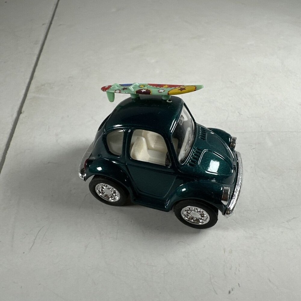 Kintoy VW Teal With Surfboard